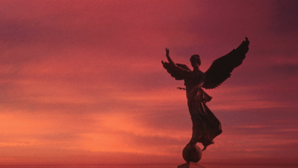 Angel statue in a red sky