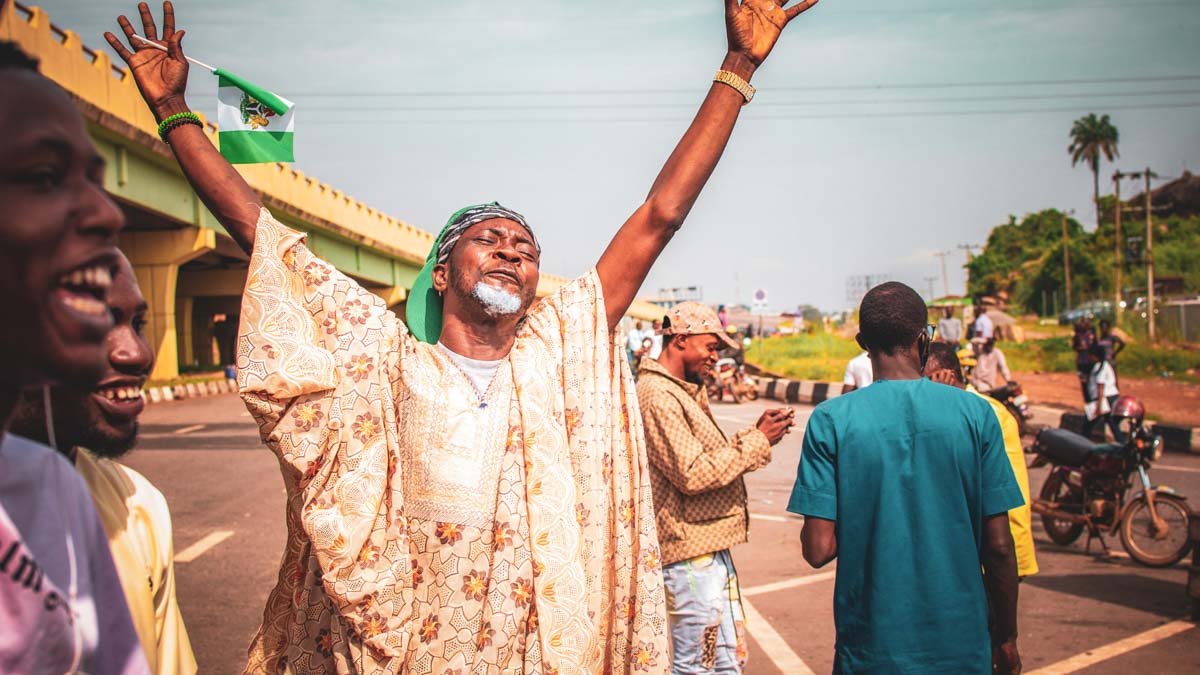 A Nigerian man from the Yoruba tribe chanting Ase