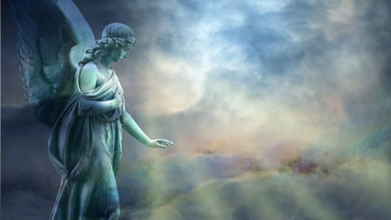 Statue of an angel with a mystical background.